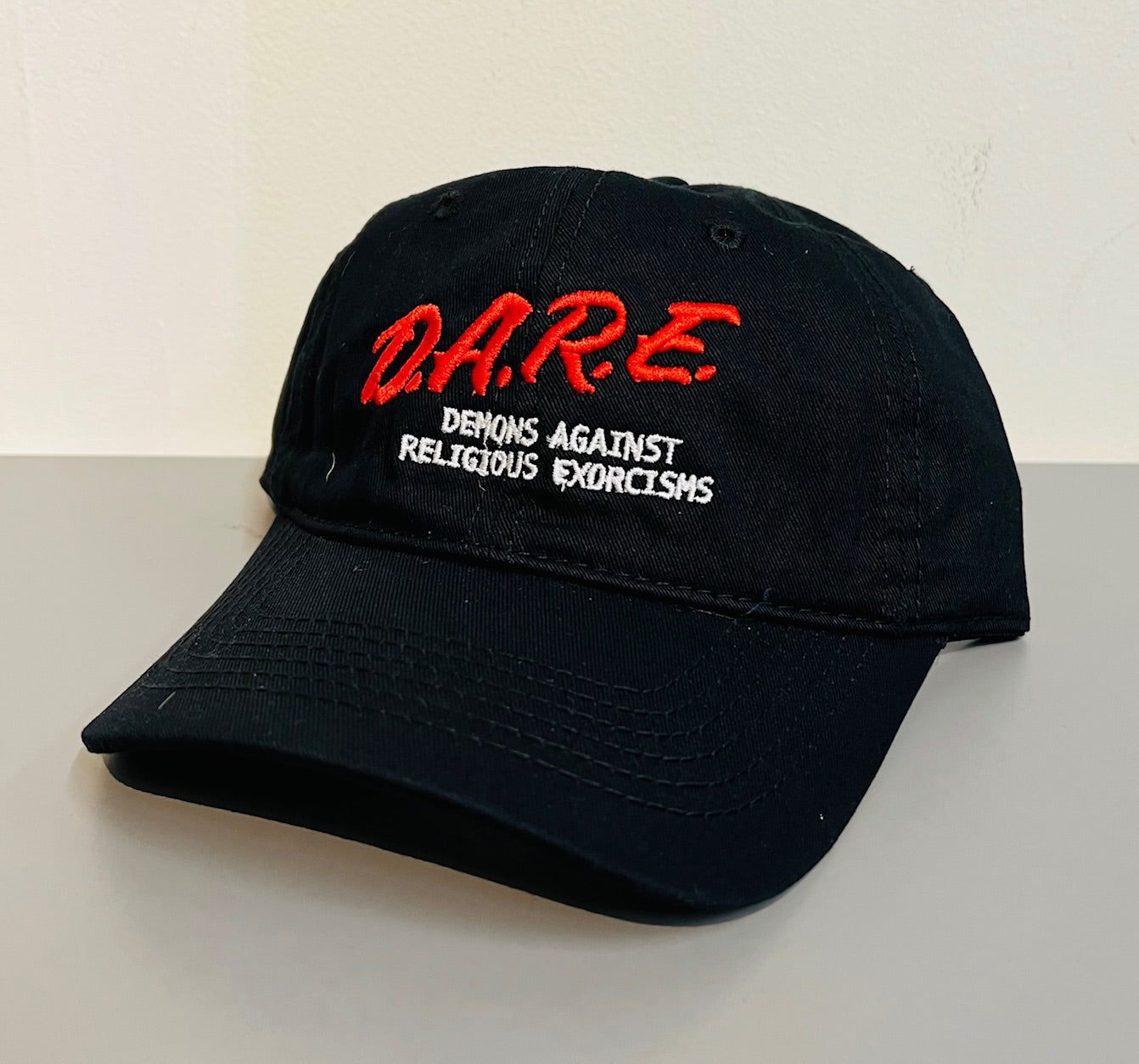DARE demons against religious exorcisms - Embroidered Dad Hat - READY TO SHIP