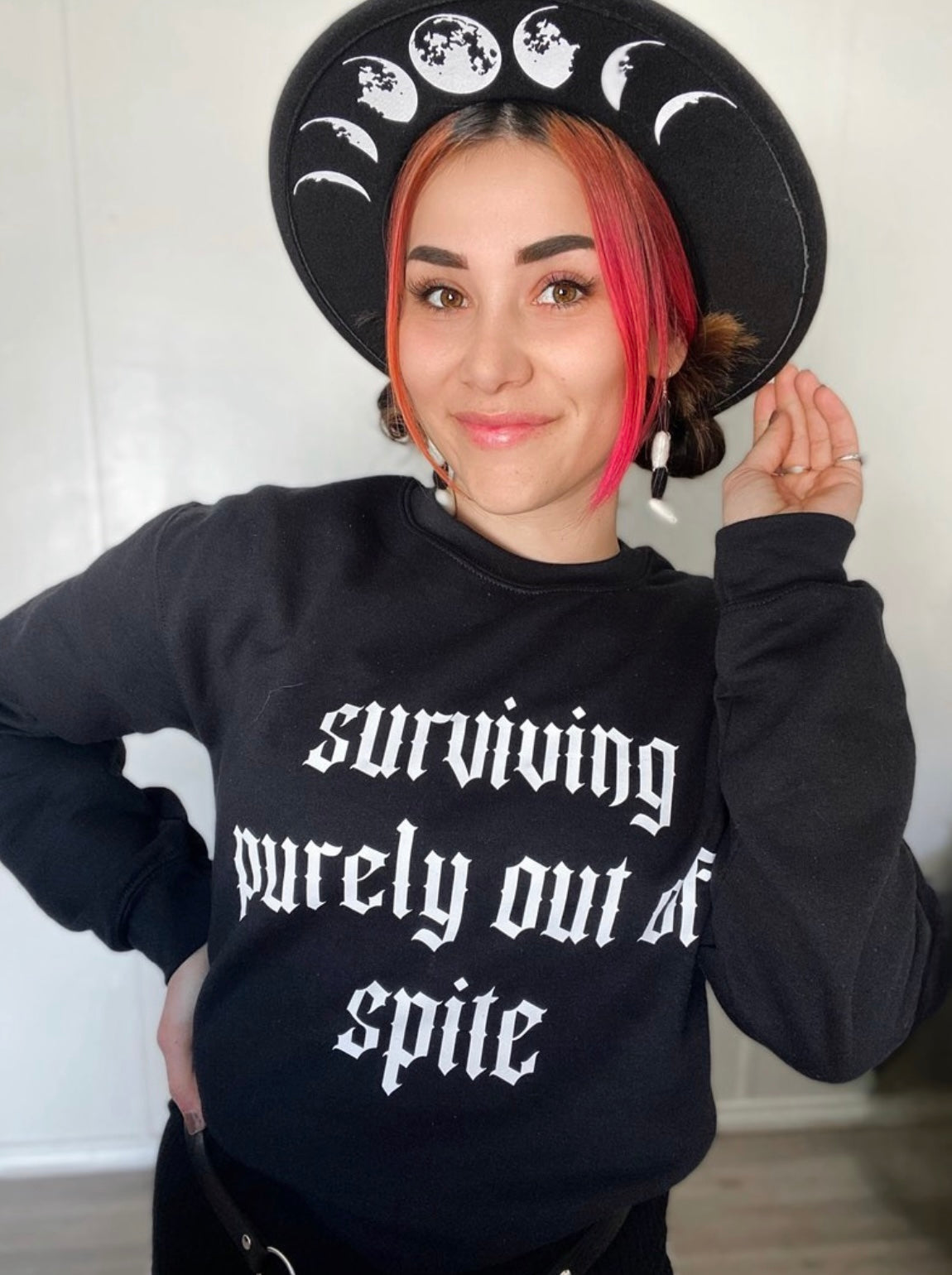 Surviving purely out of spite Pullover